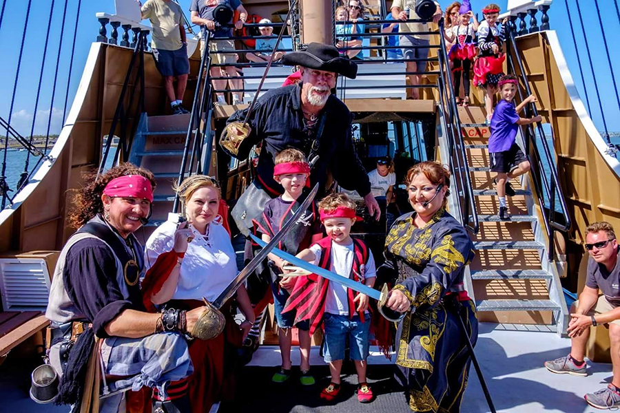 Group of pirates aboard Black Raven adventures in St. Augustine